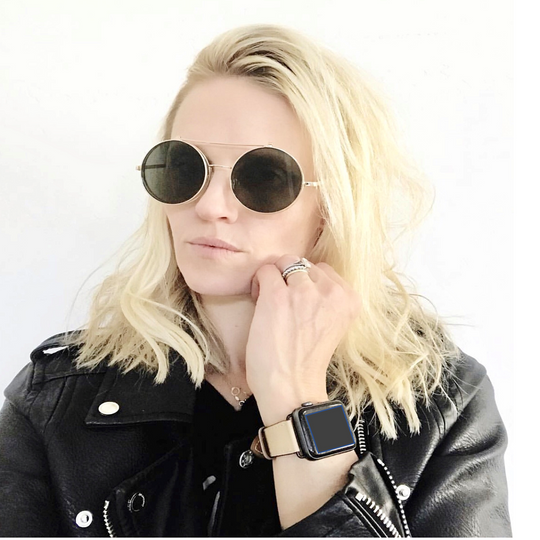 Blush Rose Apple Watch Leather Band by Juxli Home.  Handmade, stylish leather strap with rose gold hardware on a 40mm Apple watch on a canvas with a black and gray painting.