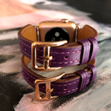 Rasin Purple Apple Watch Double Buckle Cuff by Juxli Home.  Handmade, stylish leather strap with rose gold hardware on a 40mm Apple watch on a canvas with a black and gray painting.