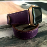 Rasin Purple Double Wrap Apple Watch Leather Band for Women by Juxli Home.  Handmade, stylish leather strap with rose gold hardware on a 40mm Apple watch on a canvas with a black and gray painting.